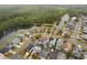 Aerial view of a subdivision with backyard pools and waterfront access to a calm river at 2980 Viscount Cir, Kissimmee, FL 34747