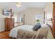 Bright bedroom with vaulted ceiling, four-poster bed, and plantation shutters at 322 High Vista, Davenport, FL 33837