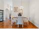 This dining room features neutral walls, beautiful tile flooring, and a chandelier above the table at 322 High Vista, Davenport, FL 33837