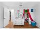 Bedroom featuring lots of natural light, a dresser, and closet at 3325 Dove Ln, Mulberry, FL 33860