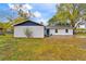 Charming single-story home with a freshly painted exterior and a well-maintained lawn at 3325 Dove Ln, Mulberry, FL 33860