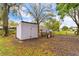 Backyard with sheds and additional storage at 3325 Dove Ln, Mulberry, FL 33860