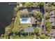 Overhead view showing the community pool and tennis court near the water at 4214 Lake Underhill Rd # A, Orlando, FL 32803