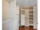 Spacious walk-in closet featuring an adjustable shelving and drawer system at 4214 Lake Underhill Rd # A, Orlando, FL 32803