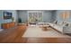 Inviting living room with sleek furniture, area rug, and access to an outdoor area at 4214 Lake Underhill Rd # A, Orlando, FL 32803