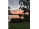 Stunning sunset view over the water, perfect for evening relaxation at 4214 Lake Underhill Rd # A, Orlando, FL 32803