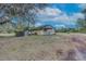 Cozy single-story home with a small front porch, offering a glimpse of its simple charm at 425 Old Chuluota Rd, Chuluota, FL 32766