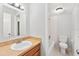 Bathroom featuring a vanity with laminate countertops, a medicine cabinet, and a tiled tub-shower combination at 4312 Lake Underhill Rd # 19, Orlando, FL 32803