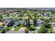 Scenic aerial view of the homes and landscape in a quiet coastal neighborhood near the Halifax River at 44 Capistrano Dr, Ormond Beach, FL 32176