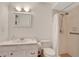 Clean, well-lit bathroom featuring a shower, sink, and toilet at 44 Capistrano Dr, Ormond Beach, FL 32176