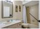 Clean, well-lit bathroom featuring a shower, sink, and toilet at 44 Capistrano Dr, Ormond Beach, FL 32176