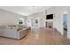 Bright living room with a light grey couch, fireplace, tile floor and neutral walls at 44 Capistrano Dr, Ormond Beach, FL 32176