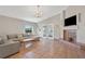 Bright living room with a fireplace, tile floor and neutral walls at 44 Capistrano Dr, Ormond Beach, FL 32176