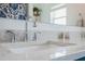 Close up of a bathroom sink, faucet and countertop featuring white counter and fixtures at 460 Forestwood Ln, Maitland, FL 32751