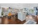 Bright and airy living area and kitchen with hardwood floors and a modern design at 460 Forestwood Ln, Maitland, FL 32751