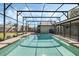 Screened-in pool surrounded by lush landscaping, ideal for outdoor enjoyment and relaxation at 460 Forestwood Ln, Maitland, FL 32751