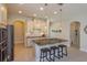 An eat-in kitchen features stainless appliances, granite counters and tiled floors at 5142 Sage Cedar Pl, Sanford, FL 32771