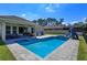 Backyard pool area with waterslide feature and fenced yard for privacy at 5142 Sage Cedar Pl, Sanford, FL 32771