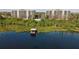 Aerial view of condos with dock and gazebo access to the serene lake at 6336 Buford St # 706, Orlando, FL 32835