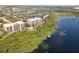 Lakefront condo community with swimming pool, dock, and stunning nature views at 6336 Buford St # 706, Orlando, FL 32835