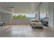 Spacious parking garage with clearly marked spaces, featuring a Tesla and other vehicles, ensuring convenient resident parking at 6336 Buford St # 706, Orlando, FL 32835