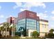 Modern Public Safety building featuring expansive windows, clean lines and professional landscaping at 8122 Pine Island Rd, Clermont, FL 34711