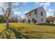 This spacious backyard includes a table and chairs and a great home view at 8155 Brocatel Ct, Orlando, FL 32822