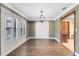 Elegant room featuring crown molding, beautiful shutters, and a doorway leading to another room at 916 Puma Trl, Winter Springs, FL 32708