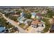 Overhead view of a community, highlighting its proximity to the beach and lush greenery at 113 Avalon Dr, Ormond Beach, FL 32176
