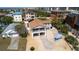 Coastal home with fenced yard, covered porch, and expansive driveway near the beach at 113 Avalon Dr, Ormond Beach, FL 32176