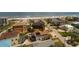 Scenic aerial view showcasing a neighborhood with a mix of homes and beautiful ocean views at 113 Avalon Dr, Ormond Beach, FL 32176