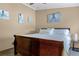 Bedroom with a queen bed, wood floors, and decor at 113 Avalon Dr, Ormond Beach, FL 32176