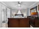Inviting bedroom with neutral walls, wood-look flooring, and ceiling fan at 113 Avalon Dr, Ormond Beach, FL 32176