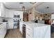 Modern kitchen with center island, stainless steel appliances, wine cooler, and eat in bar for entertaining at 113 Avalon Dr, Ormond Beach, FL 32176