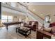Inviting living room with a pool table, comfortable seating, and stylish decor at 113 Avalon Dr, Ormond Beach, FL 32176