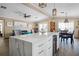 Expansive kitchen and living area with an open layout, stainless appliances, hard wood floors and dining area at 113 Avalon Dr, Ormond Beach, FL 32176
