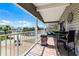 Covered porch area featuring seating, rug, and neighborhood views at 113 Avalon Dr, Ormond Beach, FL 32176