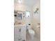 Bathroom with white fixtures and white and neutral walls and floor at 1601 E 1St Ave, Mount Dora, FL 32757