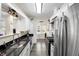 Kitchen featuring dark countertops and a stainless steel sink at 1601 E 1St Ave, Mount Dora, FL 32757