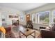 Inviting living room featuring hardwood floors, natural light, and comfortable seating at 1601 E 1St Ave, Mount Dora, FL 32757