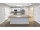 Spacious kitchen featuring an island with sink and stainless steel appliances at 1613 Reflection Cv, St Cloud, FL 34771