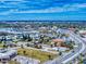 Expansive aerial view of a vibrant coastal community with beach access and convenient amenities at 1705 S Atlantic Ave # 402, New Smyrna Beach, FL 32169