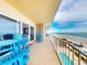 Stunning balcony with ocean views and lounge seating at 1705 S Atlantic Ave # 402, New Smyrna Beach, FL 32169