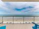 Balcony featuring ocean views, and comfortable seating at 1705 S Atlantic Ave # 402, New Smyrna Beach, FL 32169