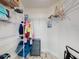 Organized walk-in closet with shelving, hanging space, and storage drawers at 1705 S Atlantic Ave # 402, New Smyrna Beach, FL 32169