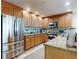 A well-equipped kitchen with stainless steel appliances and granite countertops provides a modern cooking experience at 1705 S Atlantic Ave # 402, New Smyrna Beach, FL 32169