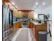 Modern kitchen design with stainless steel appliances, granite countertops, and ample cabinet space at 1705 S Atlantic Ave # 402, New Smyrna Beach, FL 32169