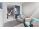 Relaxing balcony featuring comfortable seating and sliding glass doors to bring the outdoors in at 1856 Cross Prairie Pkwy, Kissimmee, FL 34744