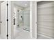 Bathroom showcases a glass-enclosed shower, modern finishes, and convenient access to a closet at 1856 Cross Prairie Pkwy, Kissimmee, FL 34744
