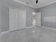 Bedroom featuring tile flooring and a closet at 1950 Windward Oaks Ct, Kissimmee, FL 34746